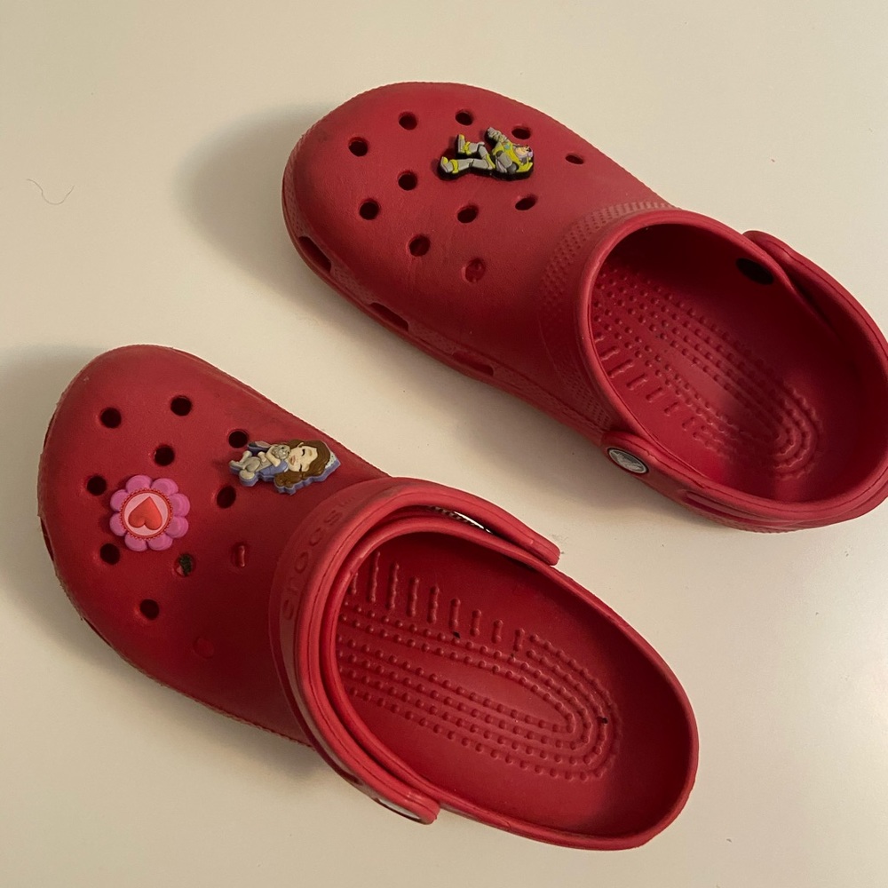 Red crocs with gibbets